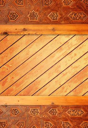 Background with antique carved wooden ornament