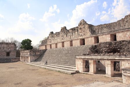 Ruins of royal complex near to ancient Mayan pyramid of the Magician in Uxmal, Yucatan, Mexico.