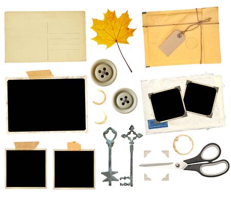 Set of elements for scrapbooking. Object isolated on white background. Vintage scissors, retro paper card, dry yellow maple leaf, keys, sellotape, stain of tea, coffee, old photo, postcard, button, photo corners