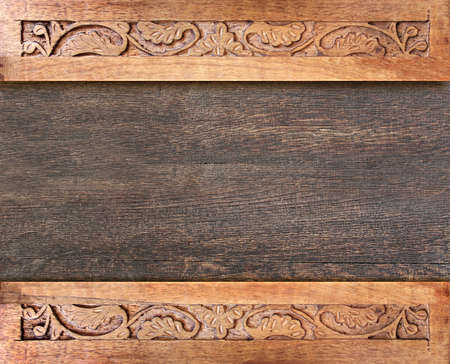 Horizontal background with wood frame and carving floral ornament. Decorative carved border on...