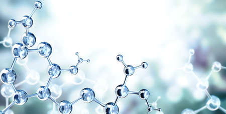 Models of abstract molecular structure on blue background. Horizontal banner with glass model of molecule. Copy space for your text. Mock up template. 3d renderの写真素材
