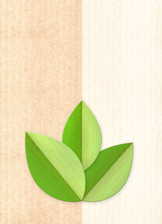 Paper cardboard background with green leaves  in paper cut style. Vertical banner with eco paper...