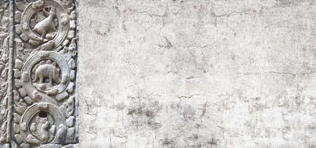 Background with ancient mysterious bas-relief with dinosaur. Horizontal banner with stone ornament...