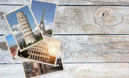 Vintage travel background with retro photos of european landmarks on old wooden boards of light gray color. Horizontal banner with old photo. Mock up template. Copy space for textの写真素材