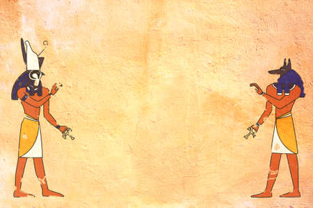 Grunge background with Egyptian gods images Anubis and Horus and old stucco texture of yellow color....