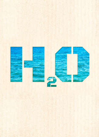 Saving water resource. H2O water symbol from paper. Sustainable development of strategy approach to zero waste, responsible consumption, pollution. Reuse and renewable resources. Eco-friendly conceptの写真素材