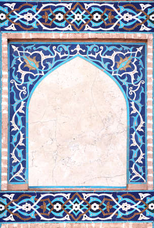 Detail of traditional persian mosaic wall with geometrical and floral ornament, Iran. Vertical frame...