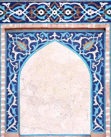 Detail of traditional persian mosaic wall with geometrical and floral ornament, Iran. Vertical frame with ceramic tile of blue, cian, brown and white colors. Mock up template. Copy space for textの写真素材