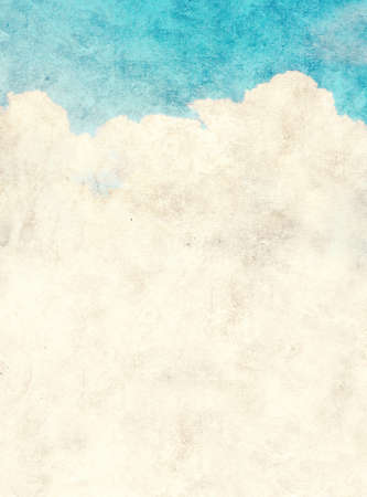 Grunge background with texture of old soiled paper of blue color and white clouds. Vertical vintage nature backdrop. Mock up template. Copy space for textの写真素材