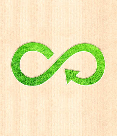 Arrows recycle symbol on striped cardboard texture. Vertical banner with eco paper texture. Paper...