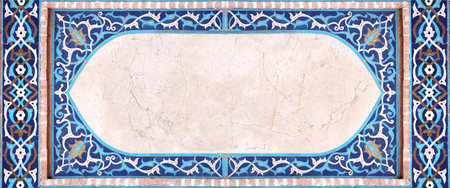 Detail of traditional persian mosaic wall with geometrical and floral ornament, Iran. Horizontal frame with ceramic tile of blue, cian, brown and white colors. Mock up template. Copy space for textの写真素材