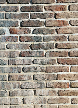 Full vertical texture of old brick wall. Vintage wash brick wallの写真素材
