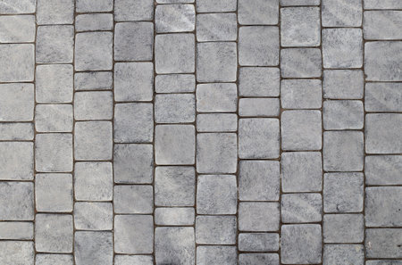 Paving slabs of gray color. Paving stones in a new walkwayの写真素材
