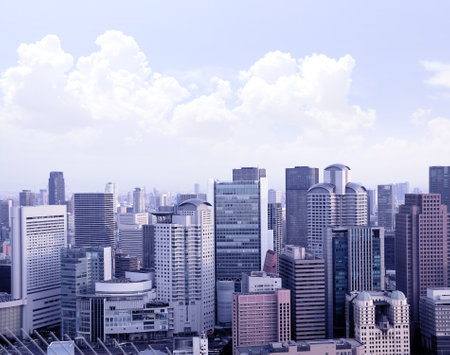 Aerial view of skyscrapers in downtown Osaka, Japan. Top view of modern Osaka district. Photo toned in blue colorのeditorial素材