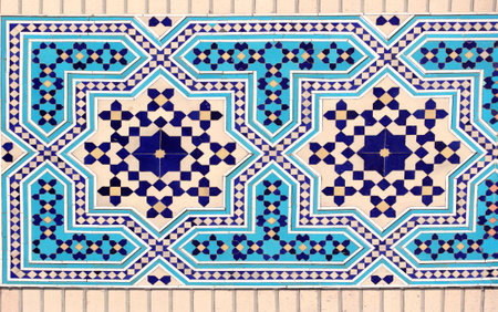 Detail of traditional persian mosaic wall with geometric ornament of blue, dark blue and yellow color, Iranの写真素材