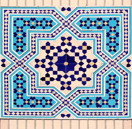 Detail of traditional persian mosaic wall with geometric ornament of blue, dark blue and yellow color, Iranの写真素材