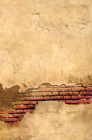 Grunge background with texture of old brick wall and cracked stucco. Photo toned in yellow color. Can be used for retro, vintage and steampunk designの写真素材