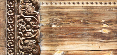 Vertical or horizontal background with wood carving frames with floral ornament. Ancient decorative carved border on wooden surface. Mock up template. Copy space for textの写真素材