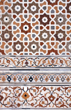 Mosaic of amber, cornelian, jasper, lapis lazuli, onyx, topaz and marble. Ancient decorative ornament wall of the famous Itimad-ud-Daula mausoleum, Agra, Uttar Pradesh, Indiaの写真素材