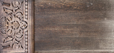 Grunge background with wood texture and ancient carved ornament, Morocco. Horizontal or vertical banner with ornament in Moroccan style. Mock up template. Copy space for textの写真素材