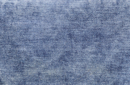 Blue color denim jeans fabric texture. Horizontal or vertical light blue denim backgroundの写真素材
