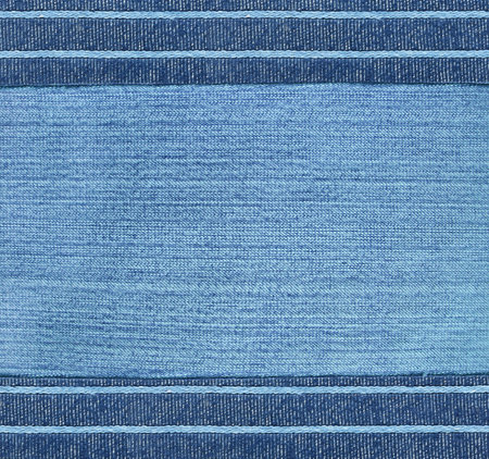 Blue denim background with striped borders. Navy color denim jeans fabric texture. Copy space for textの写真素材