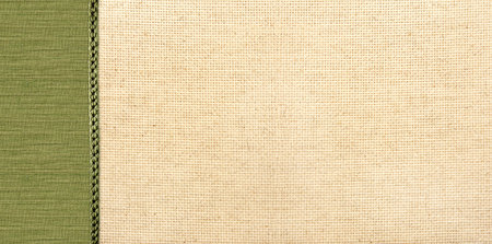 Horizontal or vertical background with beige and green canvas texture. Natural linen texture backdrop. Copy space for textの写真素材