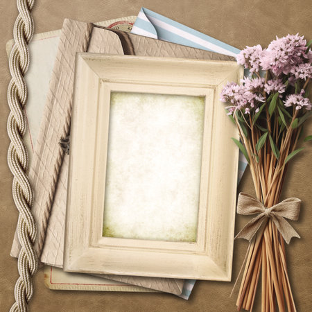 Retro photo frame, dry flowers, vintage envelope and paper card on old leather texture. Nostalgic scrapbooking backdrop. Mockup template. Copy space for textの写真素材