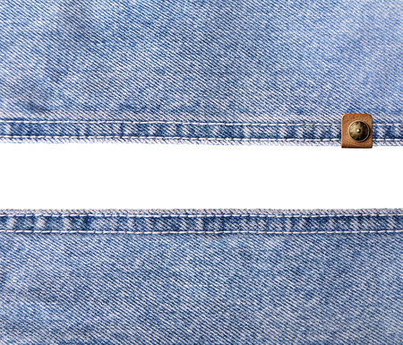 Blue denim borders with a seam and leather label. Light blue color denim jeans fabric texture. Isolated on white background. Copy space for textの写真素材