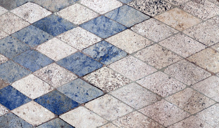 Horizontal or vertical background with natural granite tiles floor. Granite texture backdrop with vintage rhomboidal tile of blue and gray color. Polished Egyptian red granite slabsの写真素材
