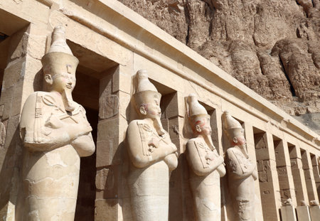 Statues of Queen Hatshepsut at entrance of Deir el-Bahari (Deir el-Bahri) the Mortuary Temple of Hatshepsut  in Valley of the Kings, Western Thebes, Luxor, Egyptの写真素材