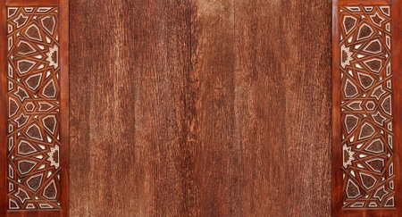 Grunge background with wood texture and ancient carved ornament, Morocco. Horizontal or vertical banner with ornament in Moroccan style. Mock up template. Copy space for textの写真素材
