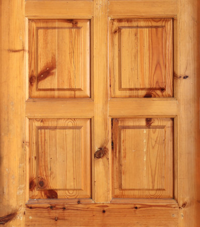 Detail of window shutter with square elements and beautiful wooden textureの写真素材