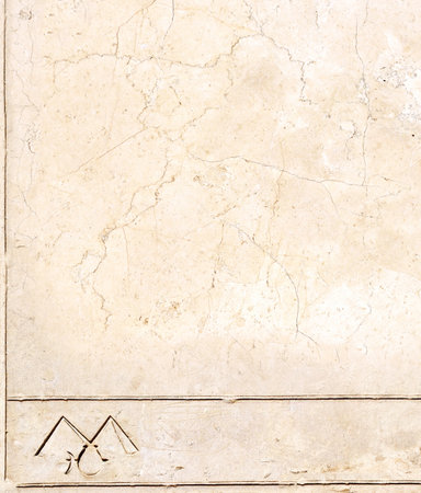 Vertical background with ancient Egyptian hieroglyphs on stone wall, Egypt, Africa. Backdrop with sandstone carving with hieroglyph. Mock up template. Copy space for textの写真素材