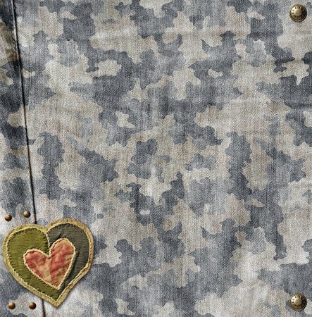 Grey denim background with camouflage denim jeans fabric texture, bronze buttons and felt heart. Valentine's day denim backdrop in camo style with old heart-shaped patch label. Copy space for textの写真素材