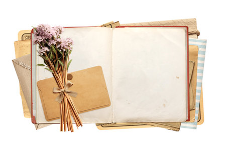 Retro book with blank pages, dry flowers, vintage envelope and paper card. Isolated on white background. Nostalgic scrapbooking collection. Mockup template. Copy space for textの写真素材