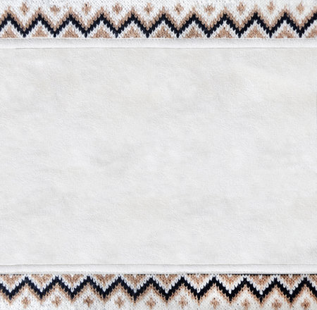 Horizontal or vertical backdrop with suede texture and border of wool material with knitted ornament. Background for scrapbooking with suede leather and sweater knitted texture. Copy space for textの写真素材