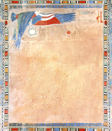 Vertical background with Ancient Egyptian Colorful Mural Wall Painting and stucco wall texture. Frame in egyptian style with Figure of eagle. Mock up template. Copy space for textの写真素材
