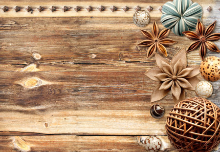Eco friendly backdrop. Horizontal background with star anise, handmade burlap star and rotang ball...