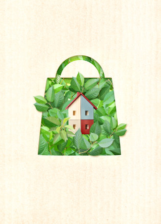 Eco friendly house buying. Wooden home model, shopping bag shape hole and green leaves on paper texture. Ecology, go green, Green Energy, environmental and conservation protection conceptの写真素材