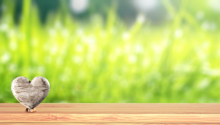 Horizontal banner with wooden heart on tabletop. Ecology, global ecological resource, eco, go green and zero waste concept. Environmental and conservation protection background. Copy space for textの写真素材