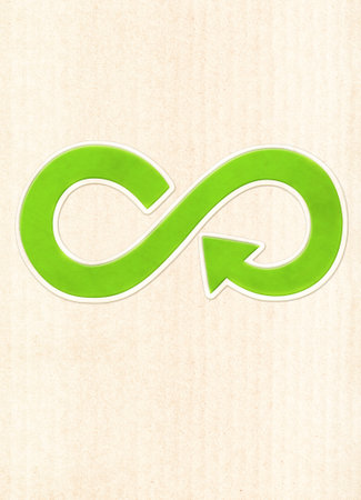 Circular economy symbol on green paper texture. Sustainable development of strategy approach to zero waste, responsible consumption, pollution. Eco-friendly, reuse, renewable resources conceptの写真素材