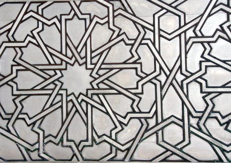 Frame with traditional islamic ornament. Copper window shutter with antique moroccan pattern. Oriental brass ornamentsの写真素材