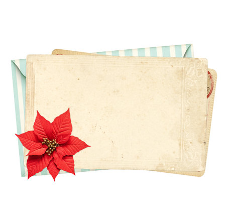 Christmas background with retro card vintage envelope and poinsettia. Nostalgic scrapbooking backdrop. Mock up template. Copy space for text. Isolated on white backgroundの写真素材