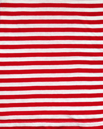 Red and white style striped fabric texture. Background with  striped closeup weave fabric. Pinstripe...