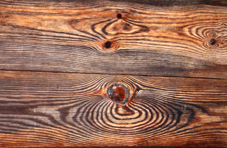 Texture of old wooden boards of brown color. Vertical or horizontal background with retro wood planksの写真素材