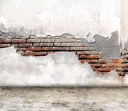 Empty interior scene with old brick wall with cracked stucco and concrete floor. Open space with cement wall and floor. Rugged weathered urban wall backdrop. Grunge interior background. 3d renderの写真素材