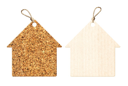 Set of eco-friendly house-shaped cardboard labels. Paper and cork tag collection. Isolated on white background. Sustainable development of strategy approach to zero waste, responsible consumptionの写真素材