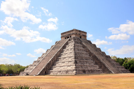 Ancient stone Mayan pyramid (Kukulcan Temple), Chichen Itza, Yucatan, Mexico. Summer vacation, travel, trip abroad on vacation, cruises and tours conceptの写真素材