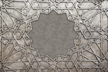 Frame with traditional islamic ornament. Copper window shutter with antique and national moroccan floral pattern. Oriental ornaments with artistic with chasing for brass. Copy space for textの写真素材